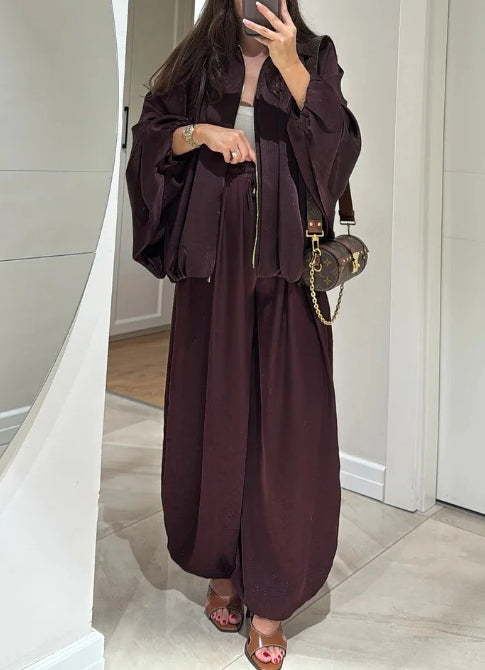 A two-piece set of casual zipper jacket and trousers